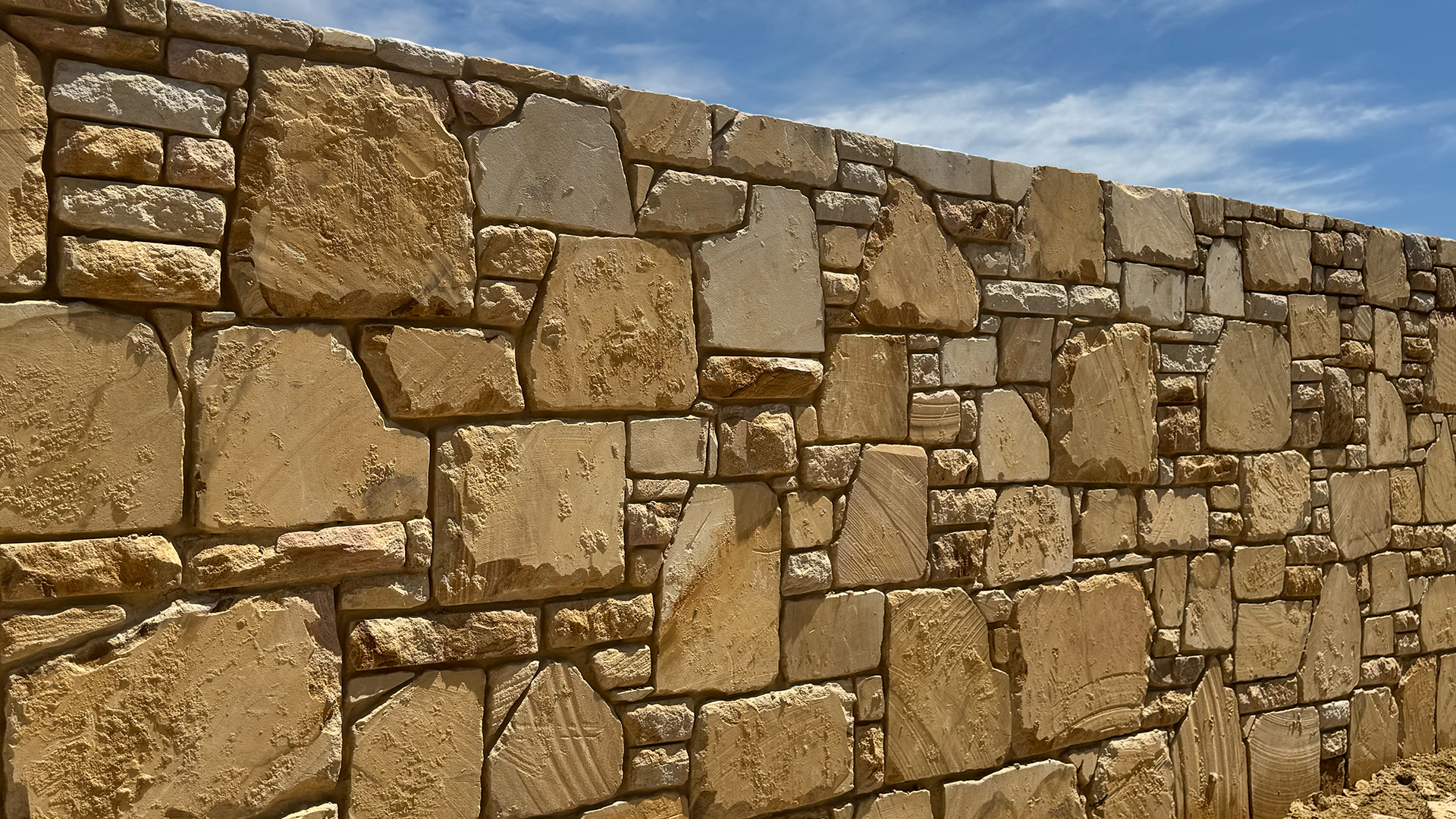 Pinkstone Sandstone Feature Wall – Sutton - Pinkstone Stonemasons